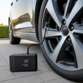 DriveNova digital tyre inflator connected to a car tyre